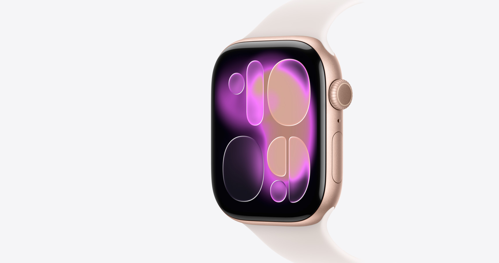 Apple Watch Series 11，展示玫瑰金色铝金属表壳、Responsive Art 表盘、右侧外观、数码表冠、麦克风、侧边按钮，搭配淡桃粉色运动型表带。